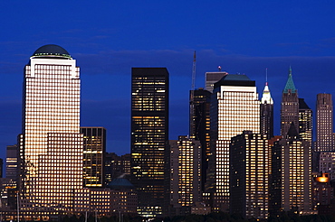 Lower Manhattan skyline at dusk across the Hudson River, New York City, New York, United States of America, North America