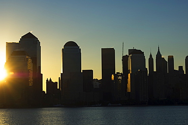 Lower Manhattan skyline at sunrise across the Hudson River, New York City, New York, United States of America, North America