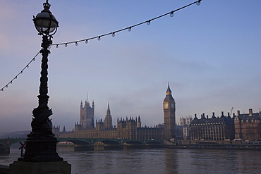 Early misty morning view of Big Ben and the Houses of Parliament across Westminster Bridge, London, England, United Kingdom, Europe