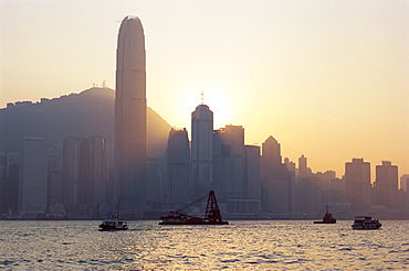 Two IFC Building and Hong Kong Island skyline across Victoria Harbour at dusk, Hong Kong, China, Asia