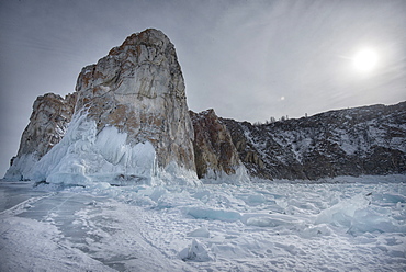 Rough ice formed at Shaman Rock, Olkhon Island as the waves freeze at the beginning of winter, Lake Baikal, Irkutsk Oblast, Siberia, Russia, Eurasia