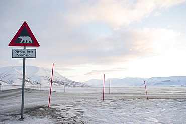 At the edge of the settlement signs warn visitors and tourists of the danger of polar bears, Svalbard, Arctic, Norway, Scandinavia, Europe