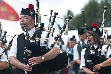 Pipers from the Dufftown and District Pipe band, Abernethy Highland Games held at Nethy Bridge Inverness shire, Scotland, United Kingdom, Europe