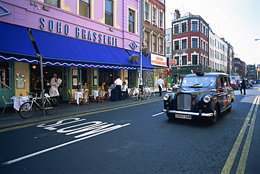 Taxi on Old Compton Street, Soho, London, England, United Kingdom, Europe