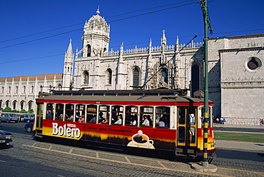 Tram in front of the Geronimos Monastery in the Belem area of Lisbon, Portugal, Europe