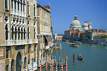 Gondolas on the Grand Canal with Santa Maria Della Salute church in the background, Venice, UNESCO World heritage Site, Veneto, Italy, Europe