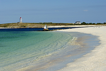 Beach and lighthouse, Islands of Glenan, Brittany, France, Europe