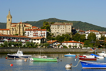 Harbour and view of old walled city and church of Santa Maria de la Asuncion, Hondarribia, Basque country, Euskadi, Spain, Europe