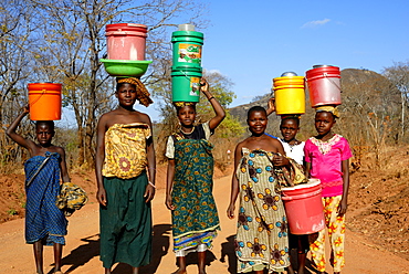 Group of women carrying water on head, Tanzania, East Africa, Africa