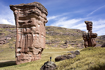 Rock formations in the Tinajani Canyon in the Andes, photographer in foreground, Peru, South America