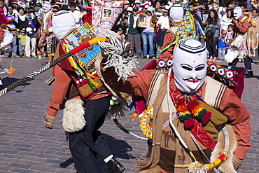 Men with whips hitting each other during the festivities of Corpus Christi, the most important religious festival in Peru, held in Cuzco, Peru, South America