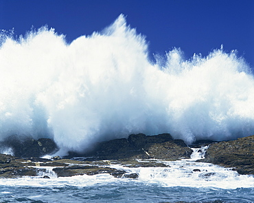 Waves crashing on rocks on the coast of South Africa, Africa