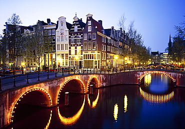 Lights on the bridges at night on the Keizersgracht in Amsterdam, Holland 