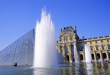 The Louvre fountains and pyramid, Paris, France, Europe