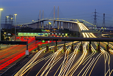 Tollgates on Queen Elizabeth Bridge at night, M25, Dartford, Kent, England, UK, Europe