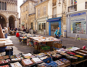 Booksellers' market stalls on Rue Musette and Church of Notre Dame, Dijon, Burgundy, France, Europe