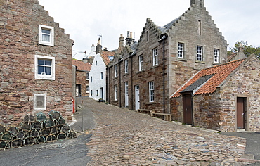 A street in Crail with lobster pots, Fife Coast, Scotland, United Kingdom, Europe