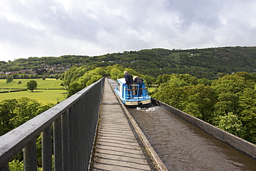 A narrow boat crossing the Pontcysyllte Aqueduct, UNESCO World Heritage Site, Llangollen Canal, Wrexham County, Wales, United Kingdom, Europe