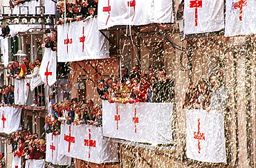 Alcoy,Alicante,Spain - Confetti showers down during the annual Moors and Christians parades