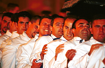 Malaga-Spain - Easter Week (Semana Santa) - Members of a brotherhood strain to carry a float 