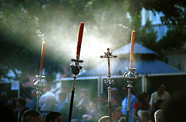 Malaga-Spain - Easter Week (Semana Santa) - Smoking candles held during a procession 