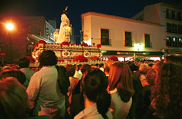 Malaga-Spain - Easter Week (Semana Santa) - A crowd watches a procession 