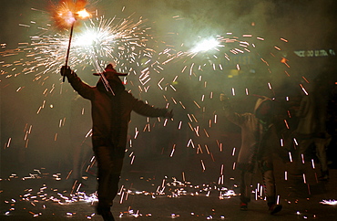 Murcia - Spain Spring Festivals - Burial of the Sardine Dancing with fireworks during the parade 