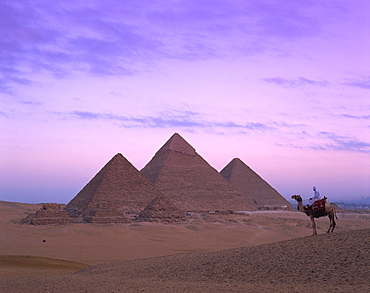 Camel rider at Giza Pyramids, Giza, UNESCO World Heritage Site, Cairo, Egypt, North Africa, Africa