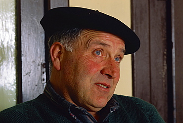 Portrait of Victor Harriet wearing a black beret, a man who still makes ewes milk cheese called Brebis, in the Basque area, Aquitaine, France, Europe