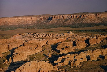 Aerial view over the village of Acoma Pueblo, in rocky landscape at dusk, New Mexico, United States of America, North America