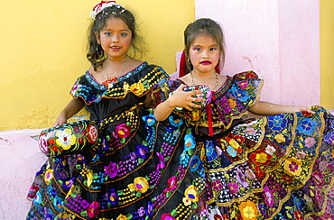 Portrait of two girls in traditional dresses during the Fiesta de Enero, Chiapa de Corso, Chiapas, Mexico, North America