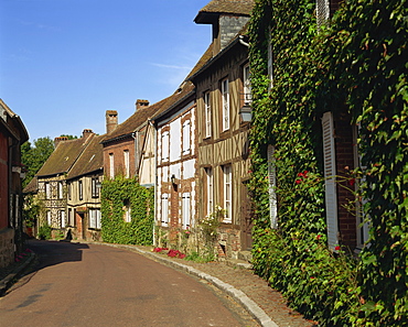 Houses line a quiet street at Gerberoy in Picardie, France, Europe