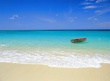 Boat moored near beach, Caribbean Sea, West Indies