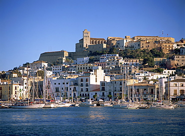 Boats in the harbour and the houses and church of Ibiza Town behind, on Ibiza, Balearic Islands, Spain, Mediterranean, Europe