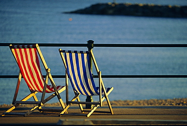 Two deckchairs on the seafront, Sidmouth, Devon, England, UK, Europe