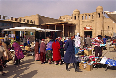 People in the bazaar at the West Gate of the city of Khiva, Uzbekistan, Central Asia, Asia