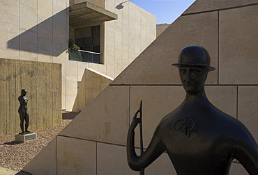 Two sculptures in front of geometrical walls of museum facade, Sculptures Garden, Israel Museum, Jerusalem, Israel, Middle East