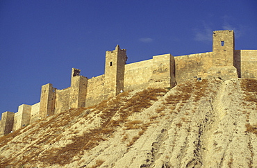 Walls of The Citadel, seen from the moat, Aleppo, UNESCO World Heritage Site, Syria, Middle East