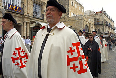 A group of Franciscan pilgrims wearing ceremonial shawls near the Jaffa Gate during Easter celebrations, Old City, Jerusalem, Israel, Middle East