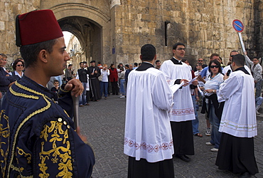 Three Palestinian priests heading the procession at St. Steven's Gate during Palm Sunday Catholic procession, Old City, Jerusalem, Israel, Middle East