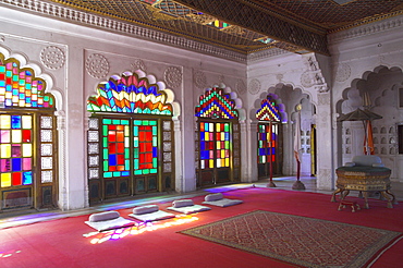 Colourful stained glass in the Maharaja's throne room, Meherangarh Fort Museum, Jodhpur, Rajasthan state, India, Asia