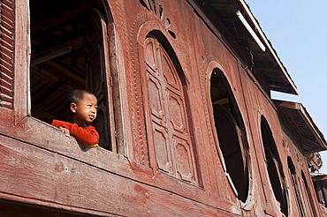 Venerable wooden Thein (consecration hall) with unique oval windows, Nyaungshwe, Shan State, Myanmar, Asia