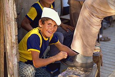 Portrait of a smiling shoeshine boy in downtown Van in Kurdistan, Turkey, Asia Minor, Eurasia