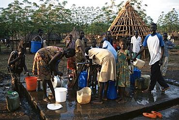 Women collecting water at the Dimma Refugee Camp, Ethiopia, Africa