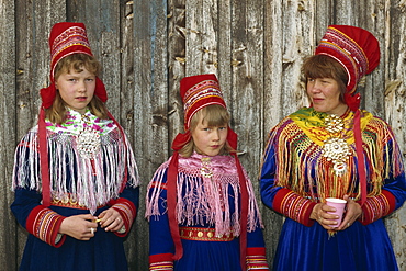 Portrait of Sami girls and woman, Lapps, in traditional costume for indigenous tribes meeting, at Karesuando, Sweden, Scandinavia, Europe