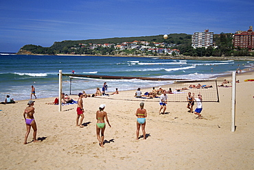 Men and women play volleyball on the beach at Manly, New South Wales, Australia, Pacific