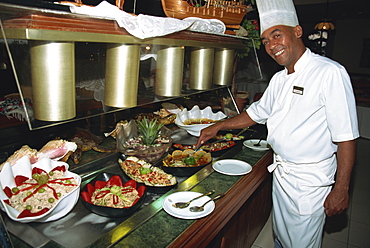 Final touches from chef to seafood buffet, Havana, Cuba, West Indies, Central America