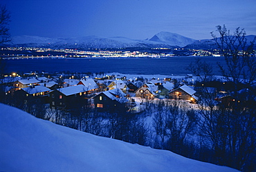 Tromso viewed from Kvaloya Island at dusk, Arctic Norway, Scandinavia, Europe