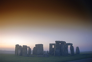 Standing stone circle at sunrise, Stonehenge, Wiltshire, England, UK, Europe