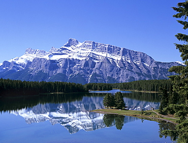 Snowy peak of Mount Rundle reflected in the water of Two Jack Lake, Banff National Park, UNESCO World Heritage Site, Rocky Mountains, Alberta, Canada, North America